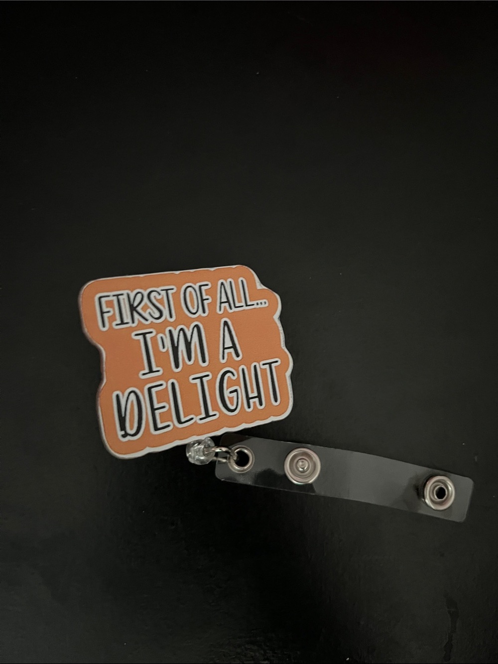 Funny Badge Reel – 'First of All... I'm a Delight' Orange Design